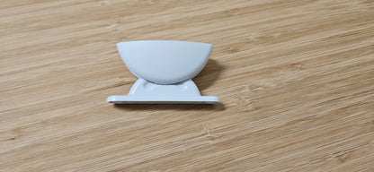 Plopp snow white door retainer