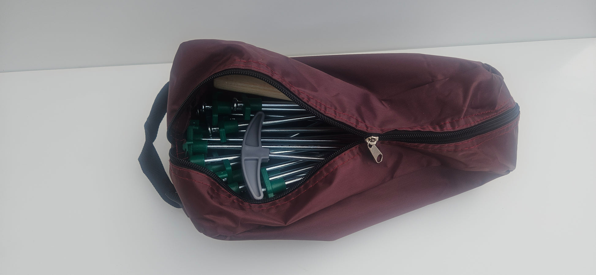 Tent peg, mallet, peg puller and bag camping kit